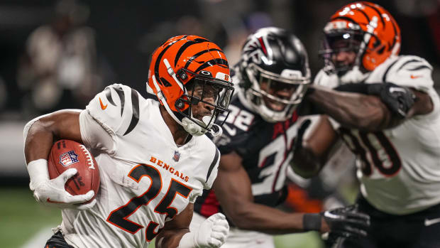 Aug 18, 2023; Atlanta, Georgia, USA; Cincinnati Bengals running back Chris Evans (25) runs the ball against the Atlanta Falcons during the first half at Mercedes-Benz Stadium. Mandatory Credit: Dale Zanine-USA TODAY Sports  